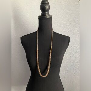 Vintage long golden tone necklace with glass beads